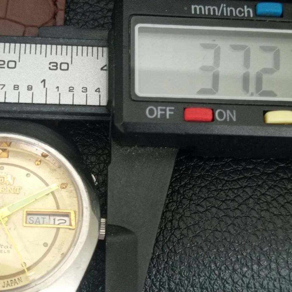 Vintage 1979 Orient Automatic Mens Silver Watch W/daydate & Gold accents